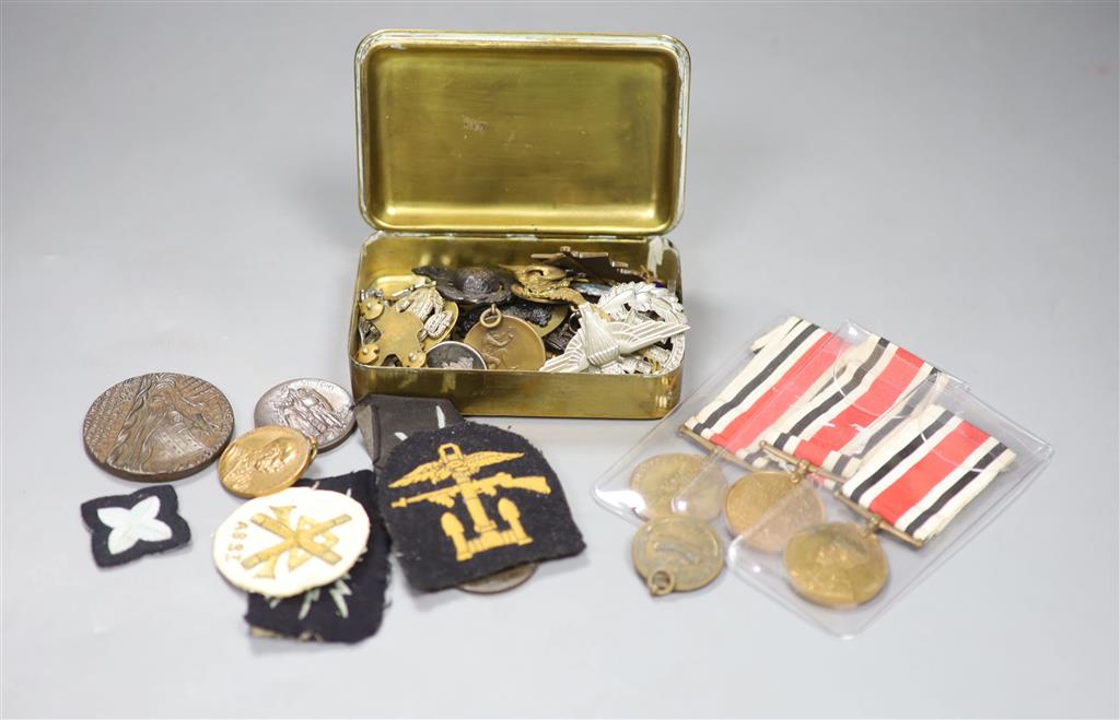 A quantity of Military and Civilian medals / badges